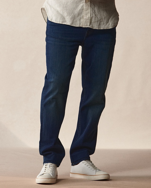 Man in blue pants. Pants and shorts 30 percent off.