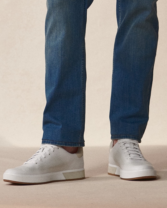White sneakers with blue jeans. Shoes 30 percent off.