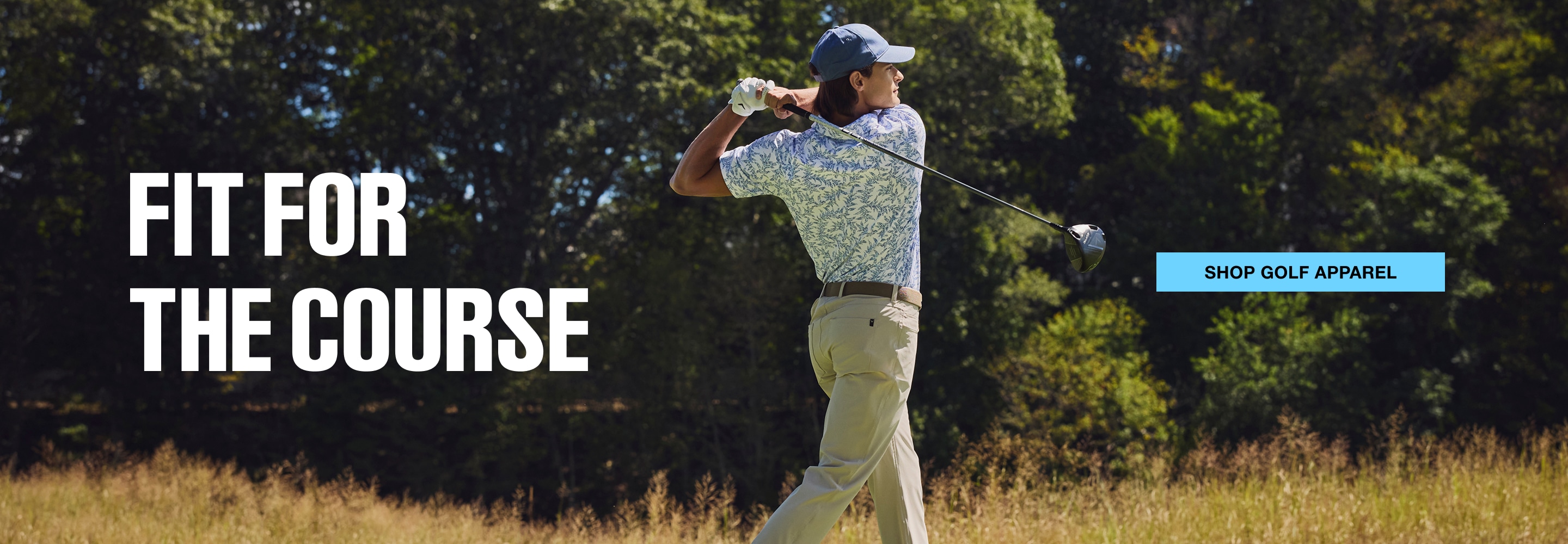 Fit for the course. Golfer in a patterned polo swings on the course. Shop golf apparel.