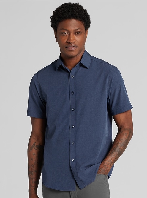 Man in a patterned casual shirt. Casual wear up to 50 percent off.