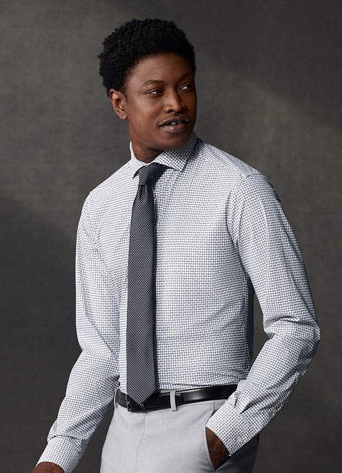 Man in a micro-check dress shirt and dark tie. Online only dress shirts 30 percent off.
