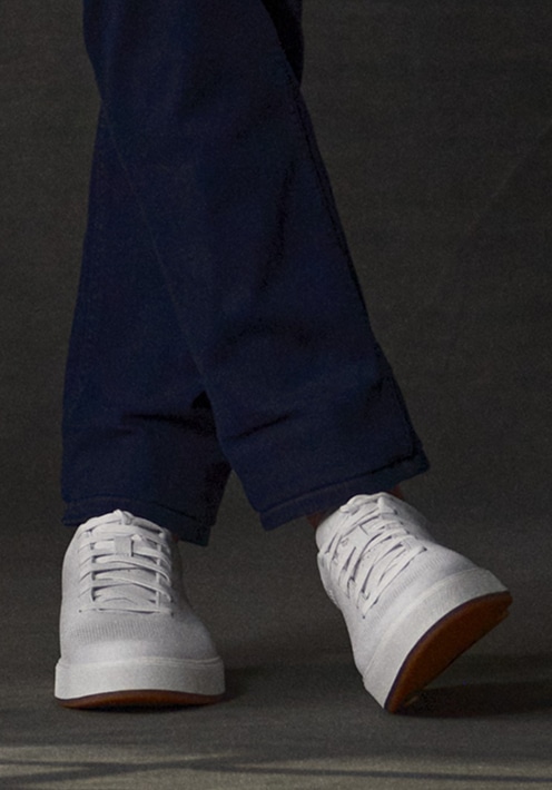 Navy pants and white sneakers. Online only shoes 30 percent off.