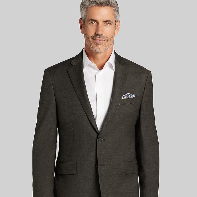 Man in a navy suit and sunglasses. Clearance suits.