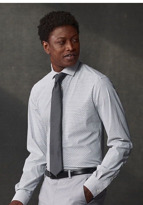 Man in a white dress shirt and tie. Online only dress shirts up to 30 percent off.