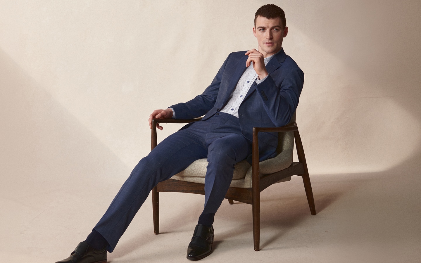 Man in a tailored suit. Flash sale up to 50 percent off sitewide.