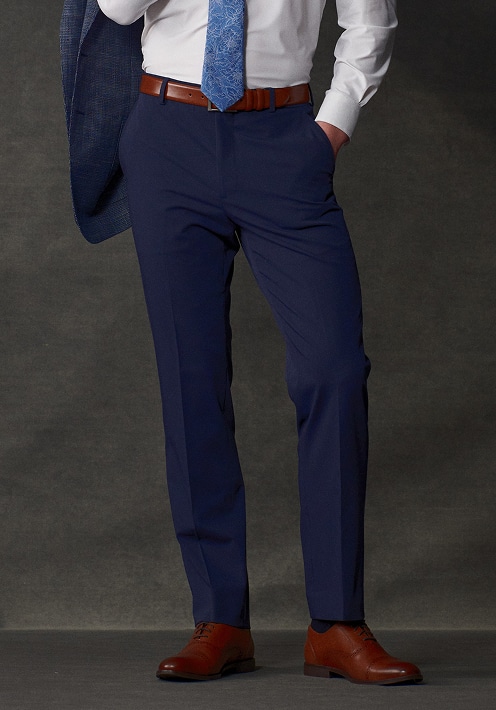 Man wearing navy dress pants. Stock Up Sale pants offer.