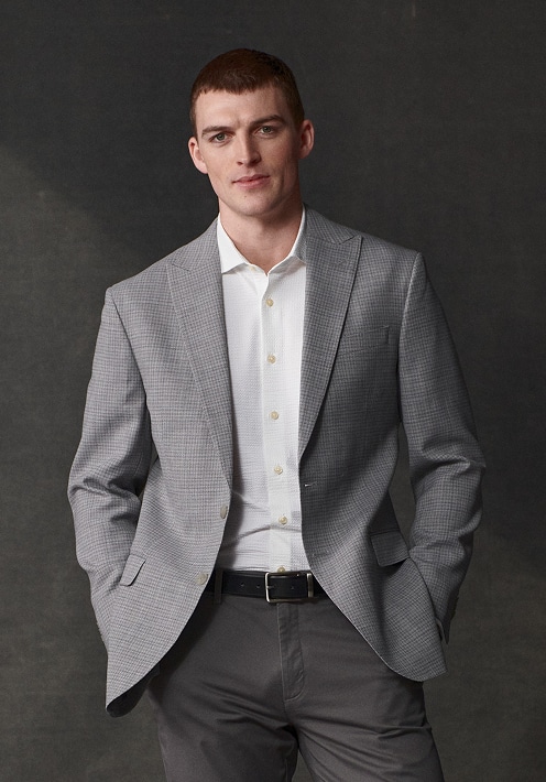 Man wearing a grey sport coat. Sport coats 30 percent off.