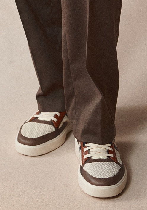 Brown and cream casual shoes.
