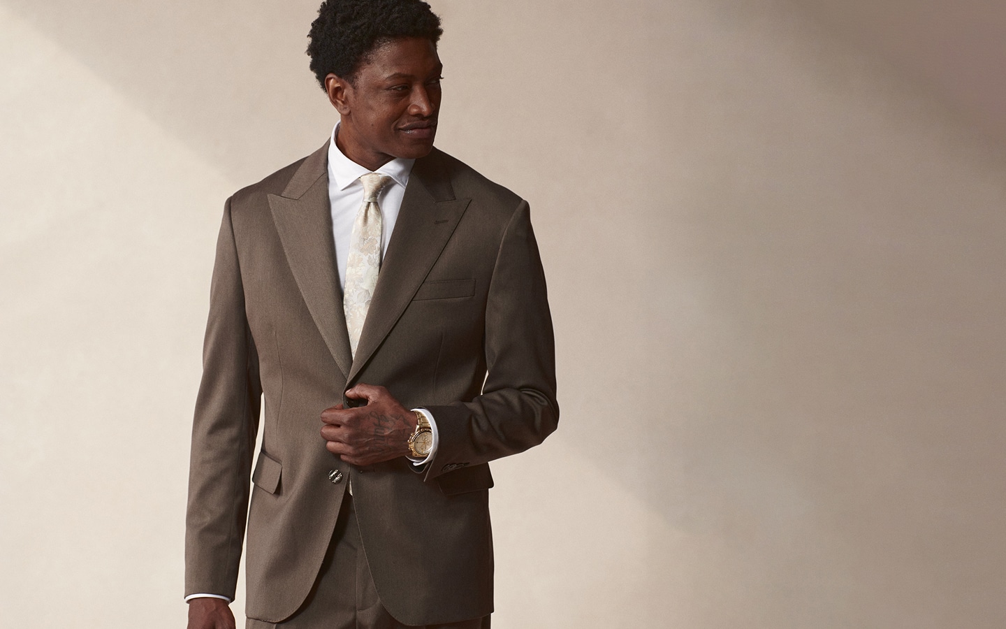 Man wearing a dark suit.