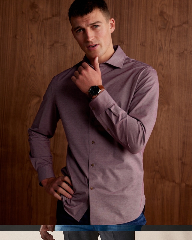 Man wearing a purple casual button-up shirt.