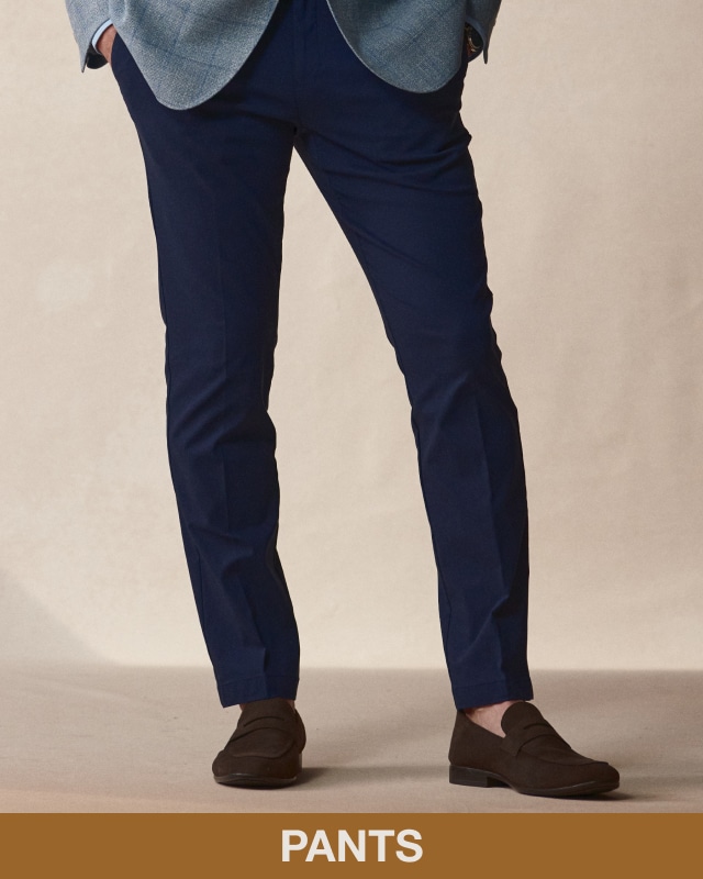 Man wearing navy pants. Pants.