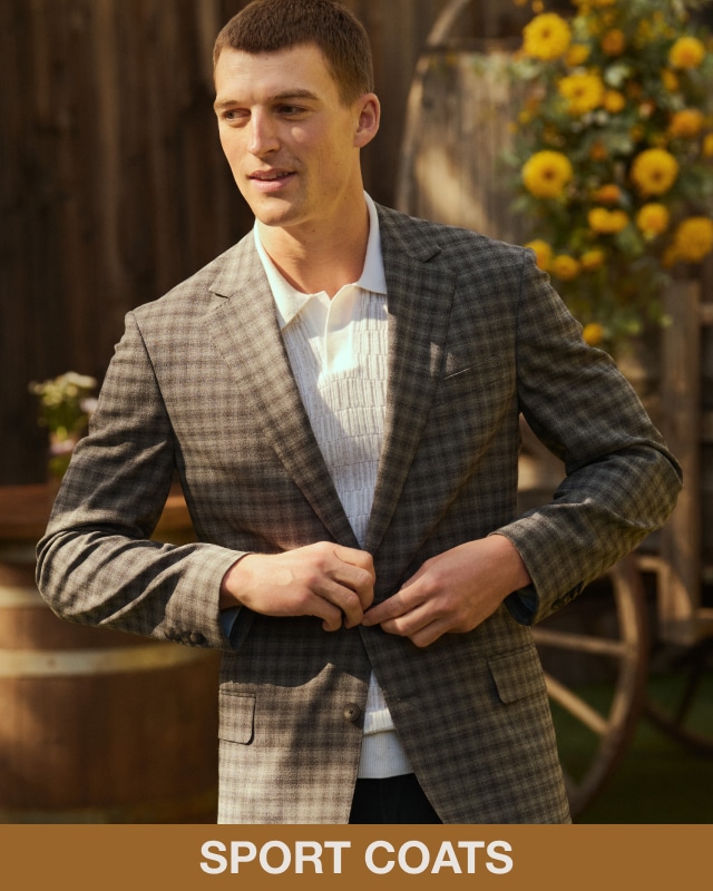Man wearing a checked sport coat. Sport coats.