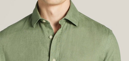 Man wearing a red and white striped linen shirt