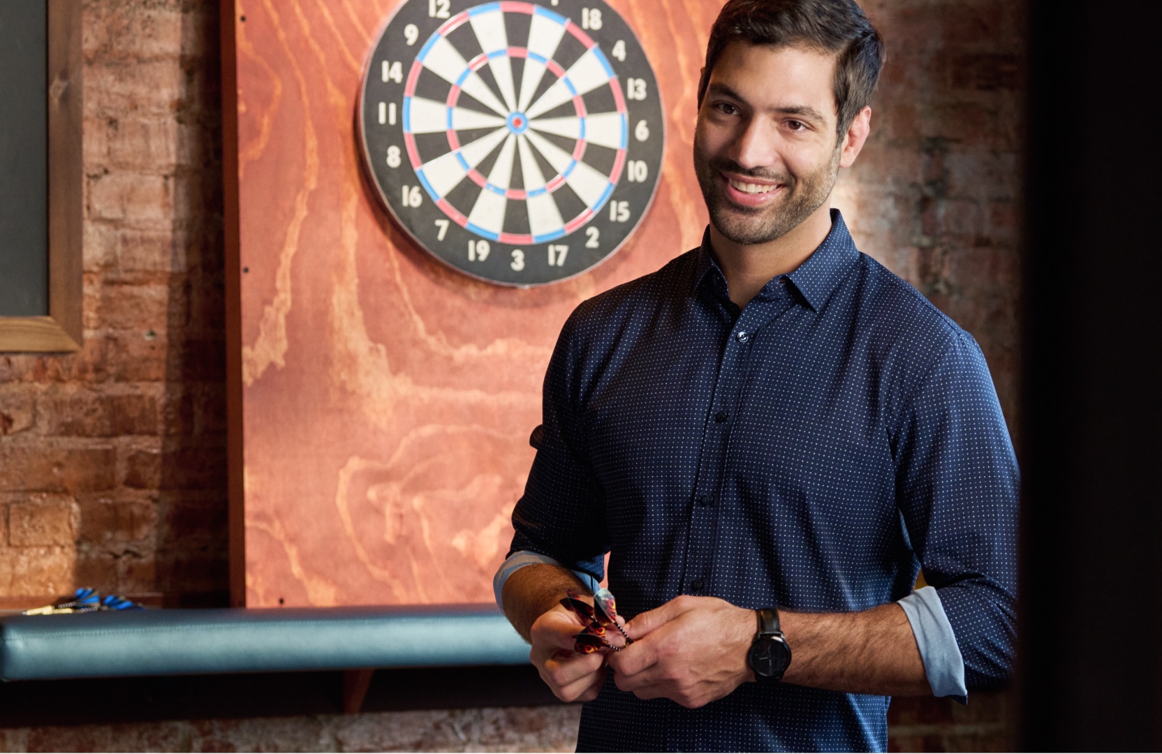Man wearing a button-up shirt, lifestyle setting