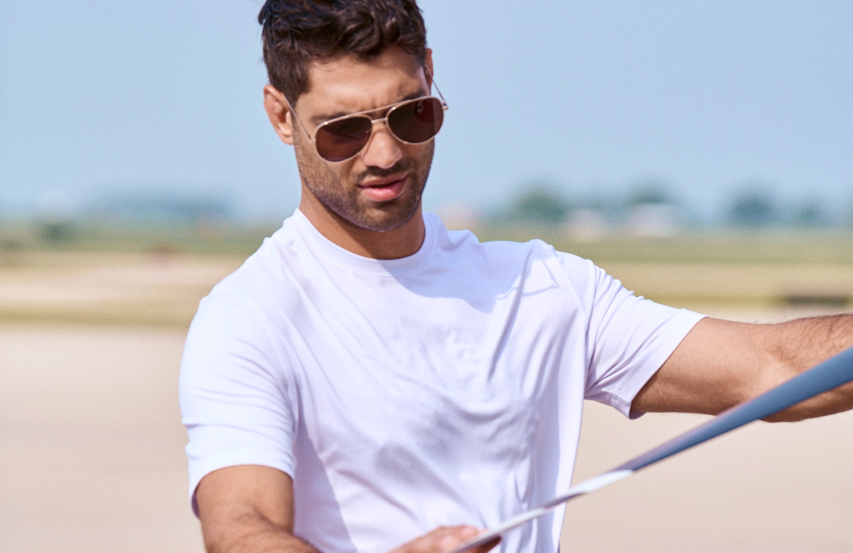 Man wearing a Chillflex polo shirt
