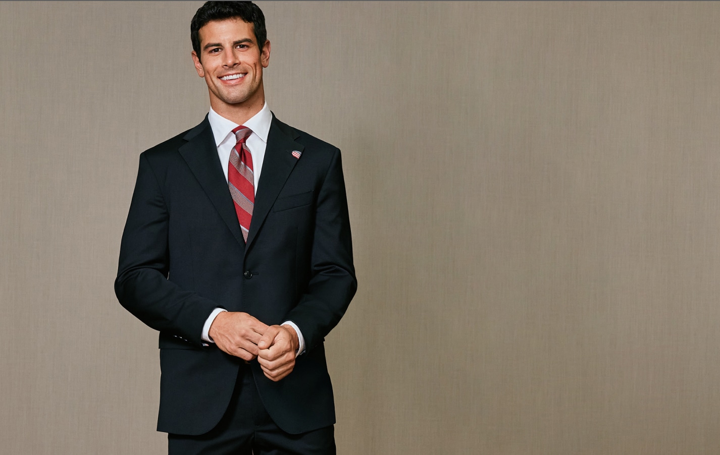 Weekend sale. Suits 25 percent off. Shop suits.